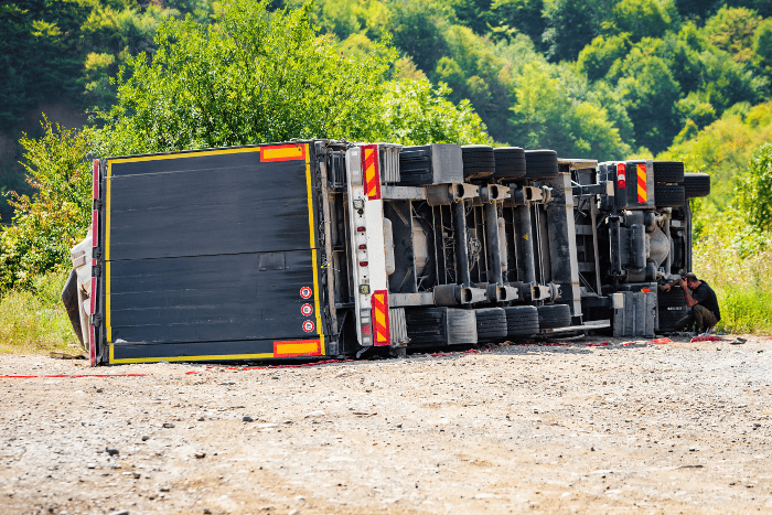 A truck that rolled over on its side